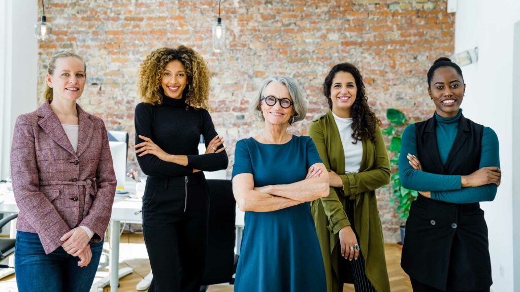 Empowered group of professional women in a range of ages and races